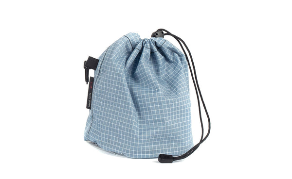 A Medium, clear-bottomed Yarn Stuff Sack in Tidal (pale blue with white grid) 200 Halcyon.